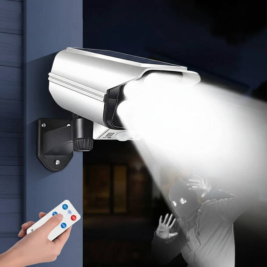 Olyyra 2000 Lumen Solar Motion Sensor Security Light – 77 LEDs, IP65 Waterproof, 360° Rotating, 3 Modes, Remote Control, Fake Camera Design | Outdoor Driveway, Yard & Garden Floodlight